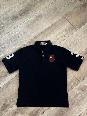 Bape Black Polo with Brown Ape Head and White Sleeve Numbers